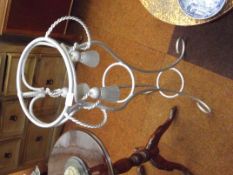 Cast metal jardiniere stand