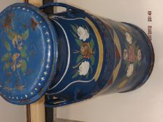 A vintage Cadbury's milk churn with barge ware pai