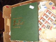 Stamp album together with loose stamps