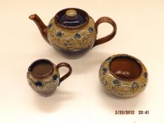 A Royal Doulton stoneware 3 piece tea service circ