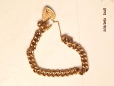 9ct gold bracelet with safety chain and heart lock