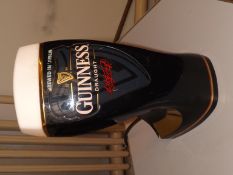 A Guinness pub lamp, working