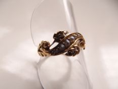 18 carat gold ring set with seed pearls and diamon