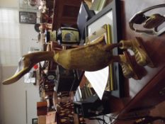 Treen figure of a duck, modelled in ice skates