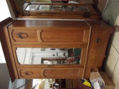 Edwardian oak mirrored wardrobe with base drawer
