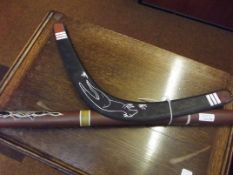 Souvenir ware didgeridoo together with a boomerang