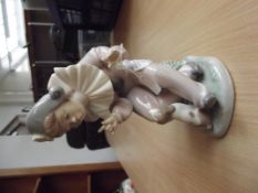 Nao figurine, child clown with puppy