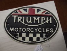 Cast iron Triumph sign