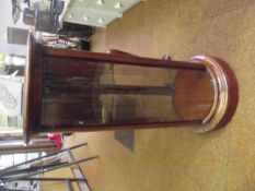 Mahogany framed cylinder shaped display cabinet