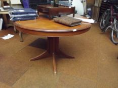 Stag circular top extending dining table and six c