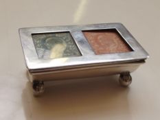 Edwardian silver stamp case, the hinged lid enclos