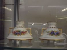 Pair of Royal Worcester vases, squat form, restora