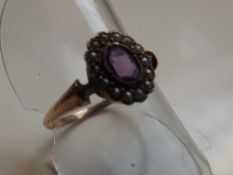 9 carat gold dress ring set with amethyst and seed