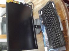 Computer monitor together with a keyboard