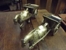 Two heavy brass horse and carts