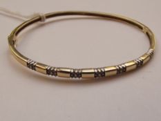 9 carat gold bangle set with diamonds, 8.2 grams