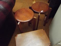 Two stools and a folding table in teak