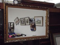 Gilt framed bevel edged mirror
