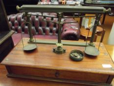 Set of brass and mahogany balance scales with weig