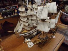 Two model ships, Constitution and The May Flower