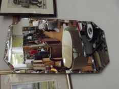 Frameless art deco wall mirror with scalloped bord