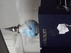 Moorcroft scent bottle with silvered stopper, boxe
