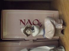 Nao figure of a girl with puppy, boxed