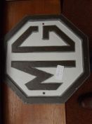 Cast iron M.G sign