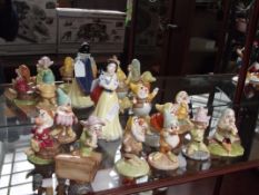Royal Doulton Snow White with ten Dwarfs (some add