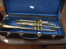 Cased brass trumpet