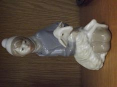 Lladro figure of a child with a sheep