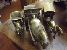 Three brass horse and carts