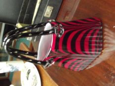 Heavy art glass in the form of a handbag