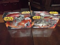 Two boxed Star Wars figures