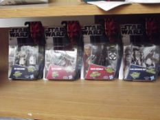 4 boxed Star Wars figures