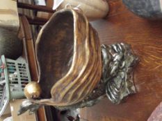 Large dolphin and nautilus shell planter