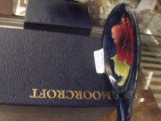 Moorcroft ashtray, in the Hibiscus pattern, later