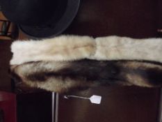 2 fur shawls