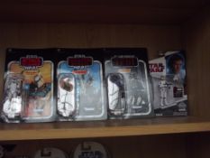 4 boxed Star Wars figures
