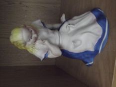 Bisque figure, Alice in Wonderland, 128/10000, indistinct signature