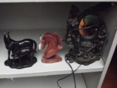 2 horse figures and an ornate mirrored lamp