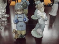 Two Nao figures of young girls
