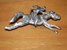 Silver stamped brooch, Horse Jockey