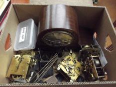 Box of clock parts for spares and repairs