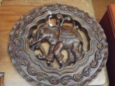 Carved wall decoration in the form of an elephant