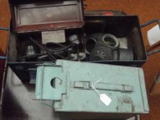 Two ammunition boxes with WWII telephone and gas m