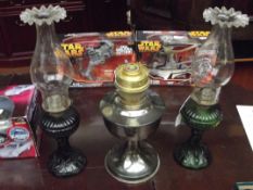 Three oil lamps