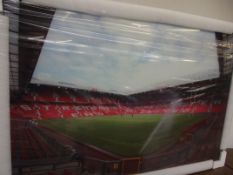 Large glass wall art depicting Old Trafford