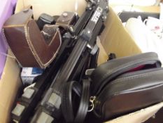 Vintage cameras and related equipment to include a