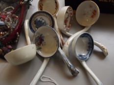 Collection of seven ceramic ladles